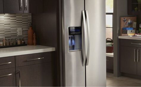 A counter-depth side-by-side refrigerator in a kitchen