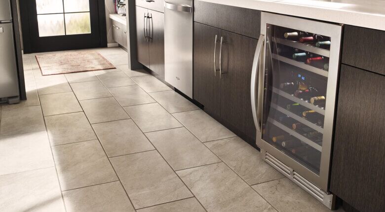 An undercounter wine center in a kitchen