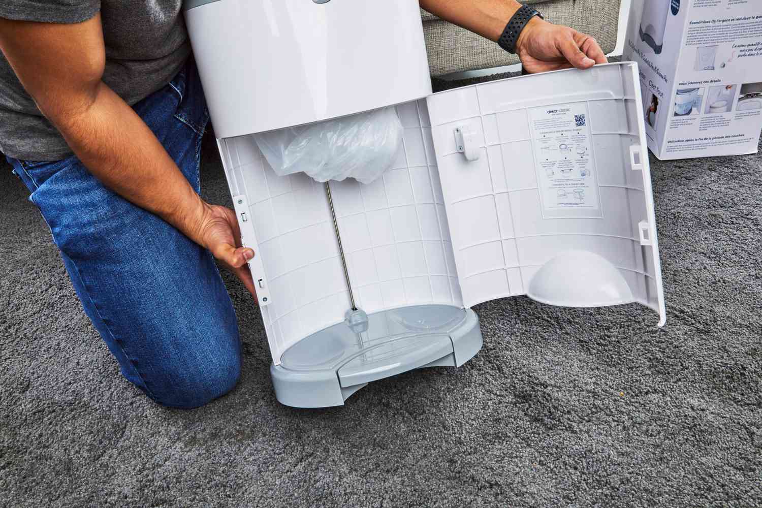 The Dekor Classic Hands-Free Diaper Pail is opened