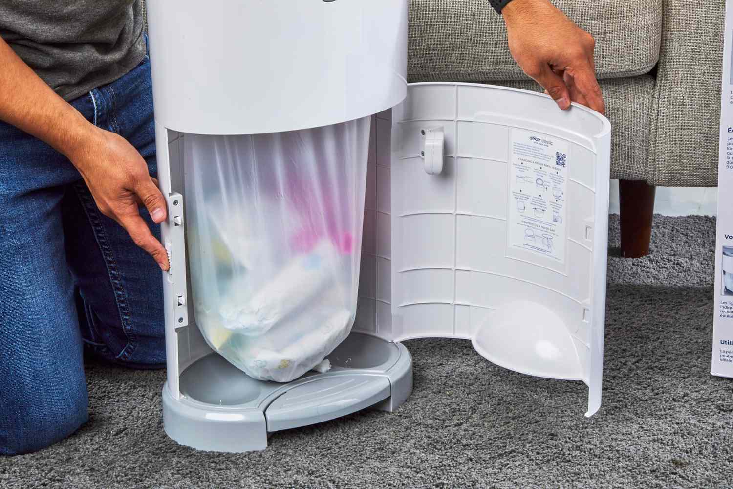 The Dekor Classic Hands-Free Diaper Pail is opened