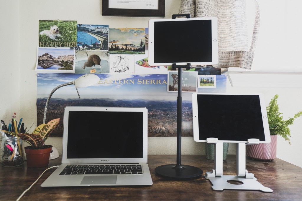 tablet stand - the saiji and kabcon stands at their full height extensions next to...